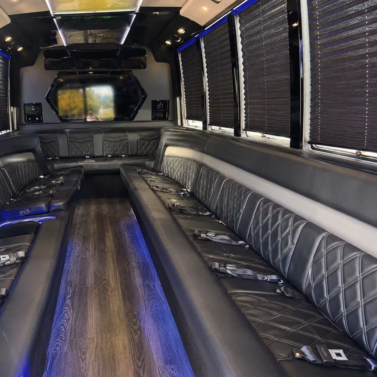 Passenger seating aboard a party bus rental serving Pomona